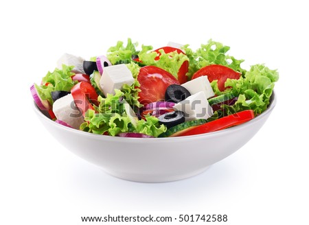 Salad with cheese and fresh vegetables isolated on white background. Greek salad. Royalty-Free Stock Photo #501742588