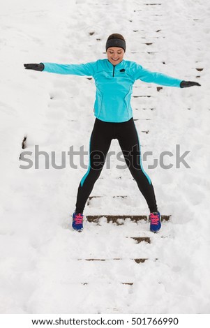 People fun spare time concept. Girl enjoying winter time. Young woman wearing sporty and warm outfit.