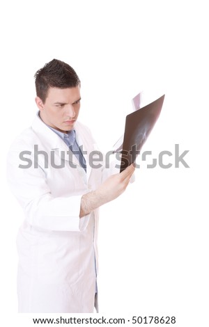 Caucasian mid adult male doctor holding up xrays. over white background