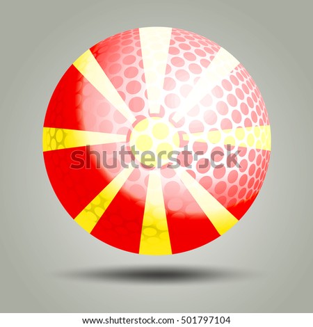 Golf ball on a gray background with Macedonia flag