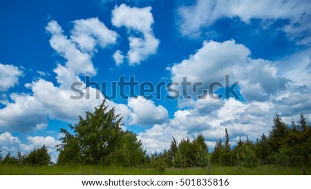 Blue sky with clouds background.                           