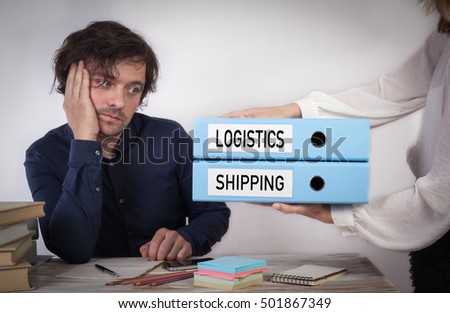 Logistics and Shipping. Two binders in the hands of women