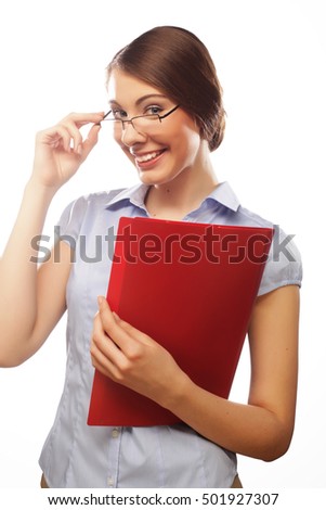 Portrait of smiling business woman with paper folders