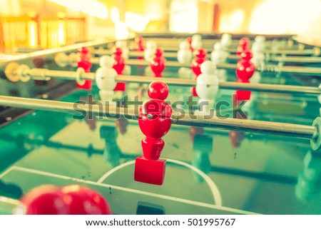 Football table game with red and white player ( Filtered image processed vintage effect. )