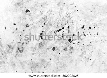 Black dust scratches on white paper