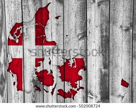 Map and flag of Denmark on weathered wood