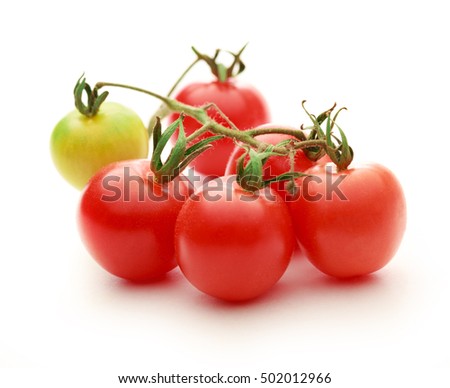 Fresh red tomatoes on the white background