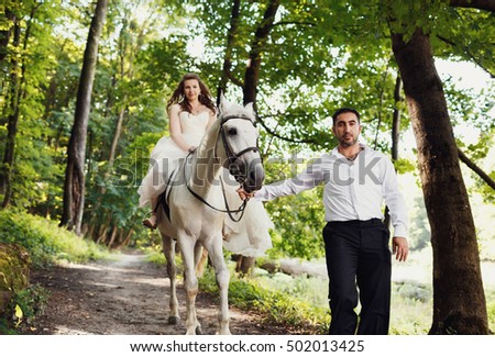 Romantic riding a horse