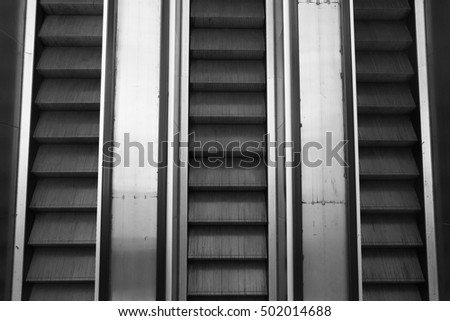 Escalator step moving up