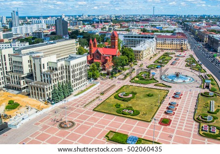 White Government Parliament Building And Lenin Statue on Independence Square in Minsk, Belarus Royalty-Free Stock Photo #502060435