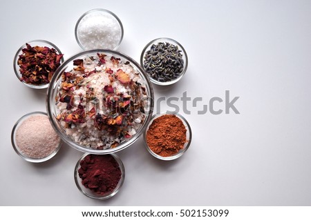 Luxurious SPA Bath salts and ingredients, top view, on white background
