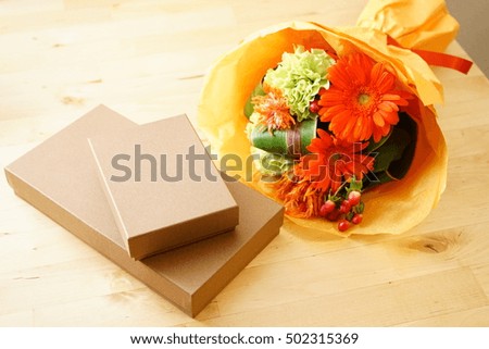 Colorful flowers and gifts on the table