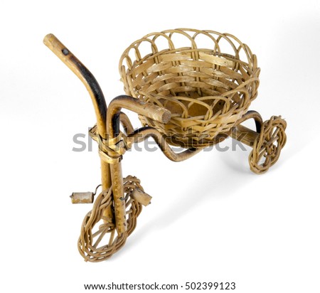 Isolated Wicker Tricycle on White Background.