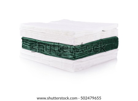 white and green napkins cut on the white background