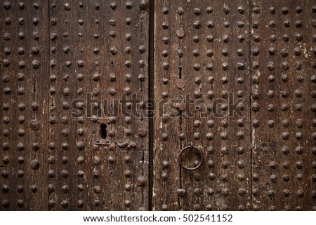 Fragment of antique door in old village of Peratallada, Catalonia, Spain