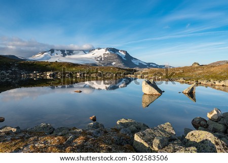 Scenery of nameless lake in Jotunheimen with mountains, Norway, Scandinavia, Europe