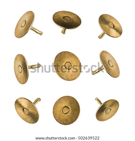 Product photograph, closeup or macro of a set of metal pushpins isolated on white seamless background Royalty-Free Stock Photo #502639522