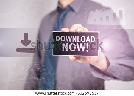 Close-Up Businessman Holding A Smartphone With The Text "Download Now!" Business concept. Internet concept.