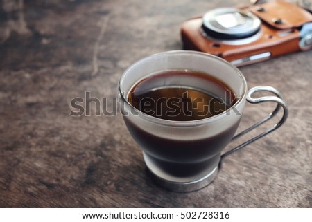 Espresso coffee with vintage camera
