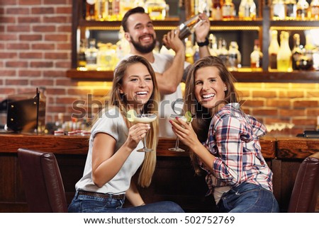 Picture of friends having drinks in bar