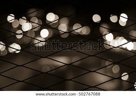 light at night behind the cage, bokeah light