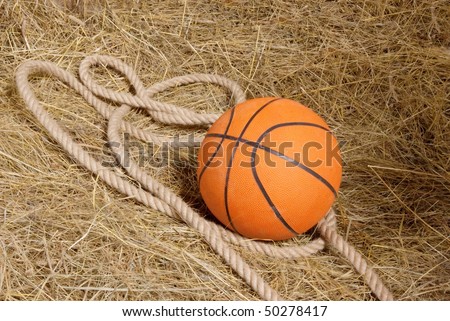 Basketball and straw with rope