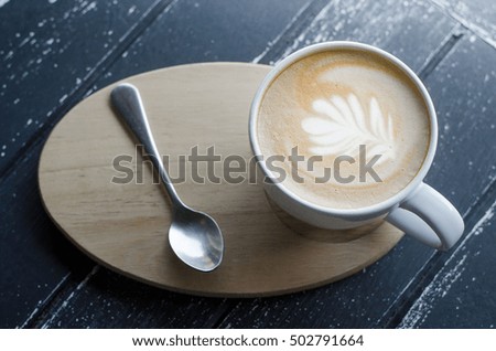 latte hot in cup white on the table wood