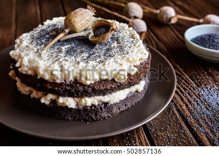 Poppy seeds cake with whipped cream and mascarpone filling