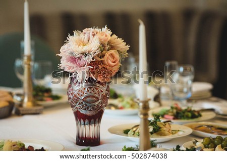 colored bouquet of flowers on the table