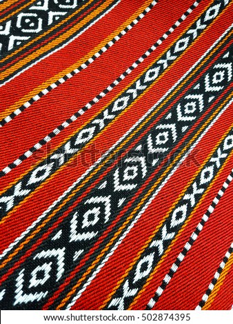 A Red Theme Arabian Sadu Rug Weaving Patterns Closeup Royalty-Free Stock Photo #502874395