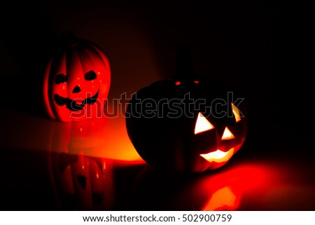 Halloween - Jack-o-lantern pumpkin with candlelight 