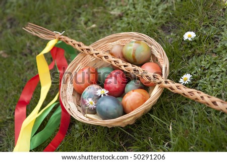 Easter stick and colorful eggs