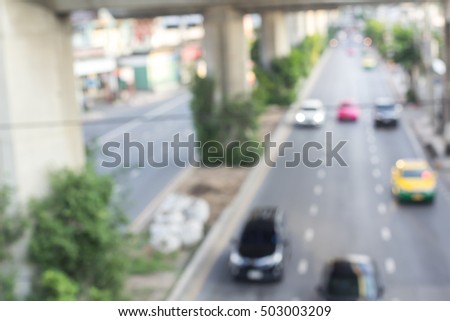 Blurred road with car running,blurred image car running on road