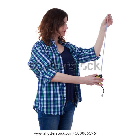 Young woman in casual clothes over white isolated background holding measuring tape, happy people and construction concept
