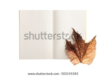 A empty(blank) white spread note with red(brown, yellow) leaf(leaves) for fall(autumn) isolated white.