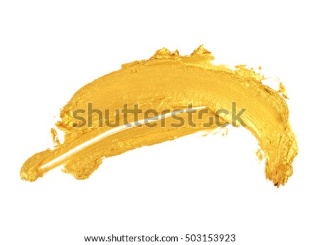 Strokes of golden paint isolated on white background
