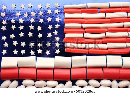 USA flag made of different candies, closeup