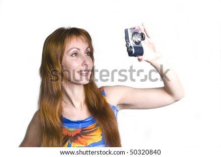 Young smiling woman with camera