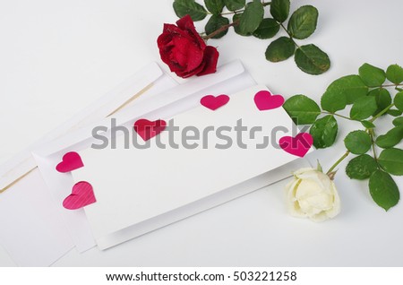 Envelops, letters, roses and red hearts. Copy cpace.