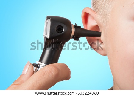 ENT medical examination with the otoscope, in one child Royalty-Free Stock Photo #503224960