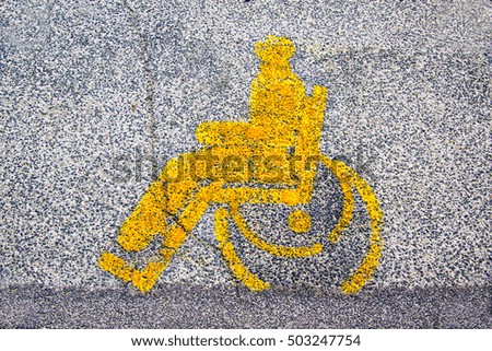 handicapped sign Painted on a street