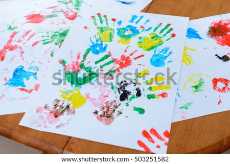 Watercolor hands print a little baby