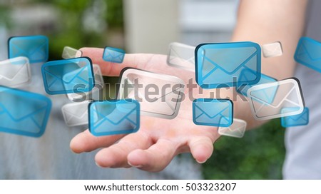Businessman holding digital email icons in his hand ??3D rendering