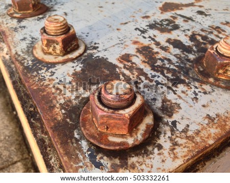 Rusty Old Industrial Screw Nut and Bolt Royalty-Free Stock Photo #503332261