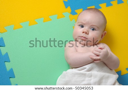 baby on a puzzle background