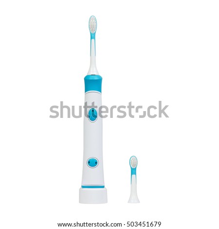 Electronic ultrasonic toothbrush on a charge stand with one extra replacement brush head isolated on a white background. Toothbrush for kids
