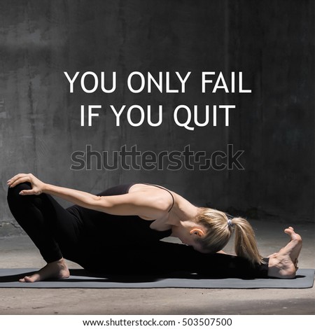 Beautiful sporty fit young woman working out indoors against grunge dark grey wall. Model sitting in Head to Knee Forward Bend. Full length. Square image. Motivational text "You only fail if you quit"