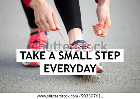 Female hands tying shoelace on running shoes before practice. Woman athlete preparing for jogging outdoors. Sport active lifestyle concept. Motivational text "Take a small step everyday"