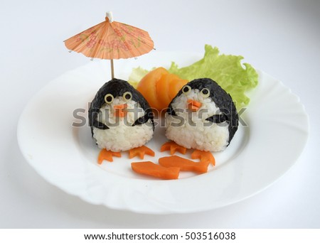 Penguins are made of rice. Creative food for good mood and appetite