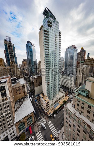 Tall buildings along the New York skyline above 5th Avenue